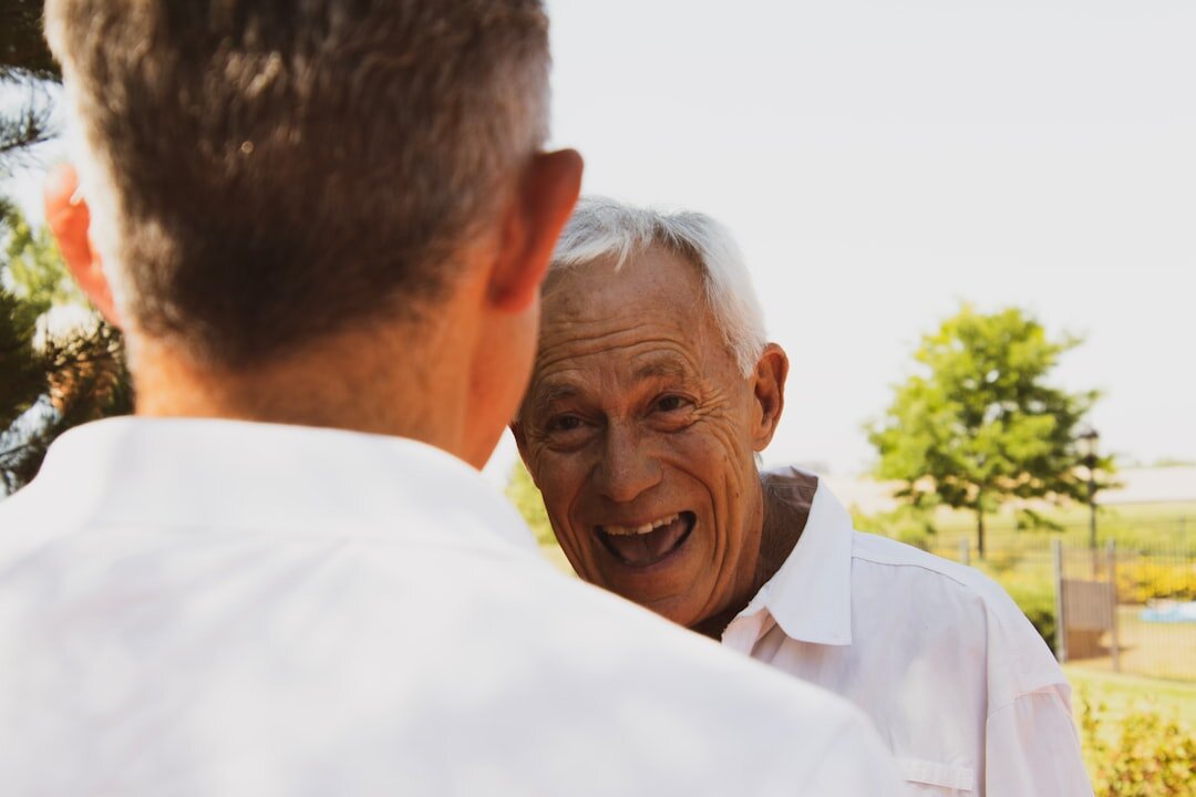 elderly man sharing story